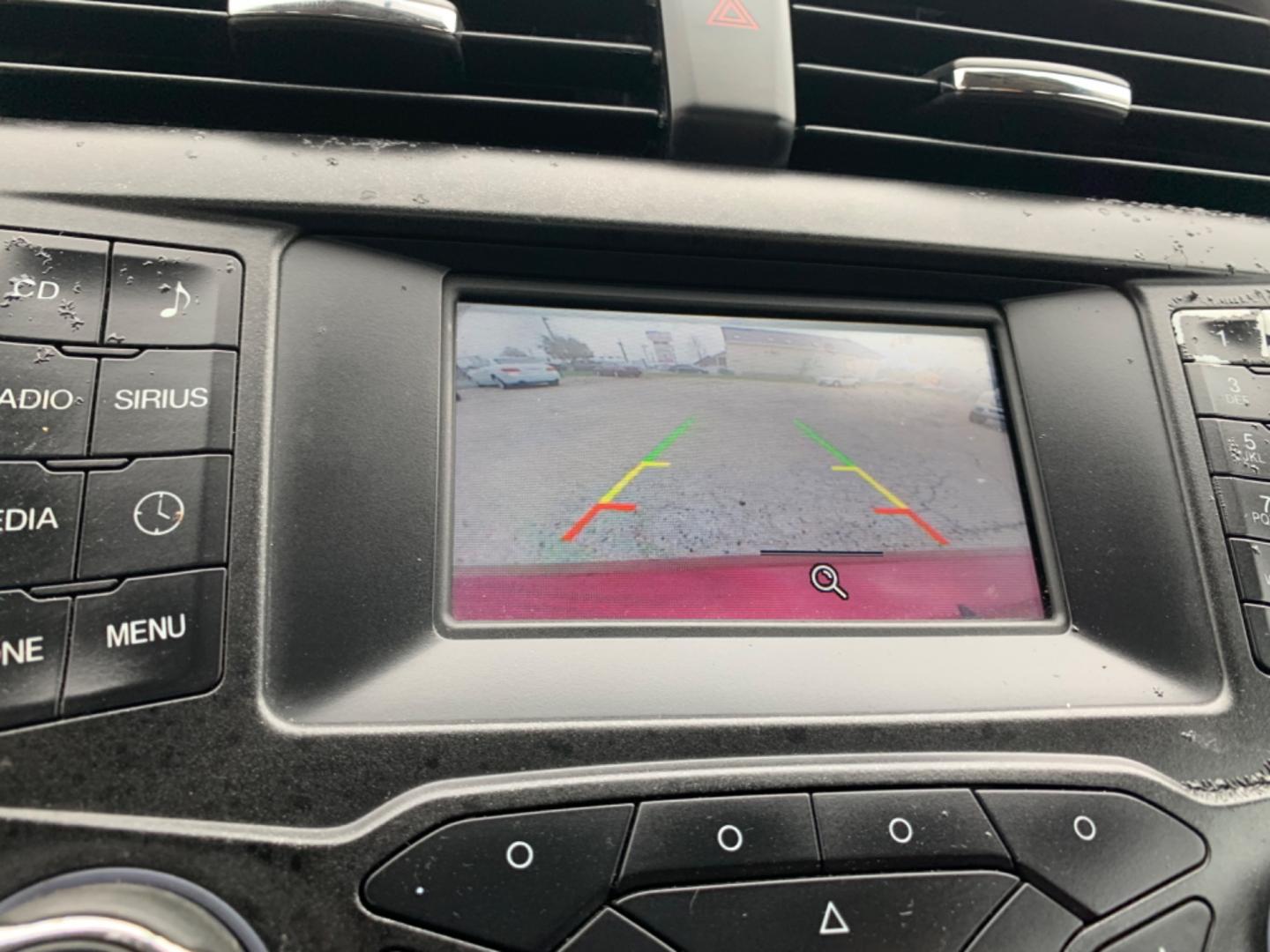 2015 Maroon /Black Ford Fusion SE (3FA6P0H95FR) with an 2.0L L4 DOHC 16V engine, Automatic transmission, located at 1830 North Belt Line Road, Irving, TX, 75061, (469) 524-0199, 32.834373, -96.993584 - Photo#3